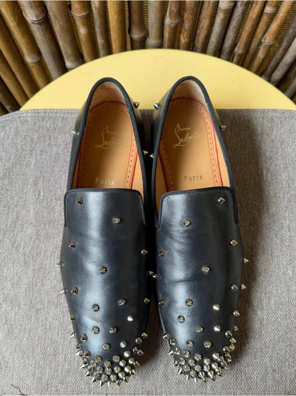 CHRISTIAN LOUBOUTIN men’s spiked leather loafers.
